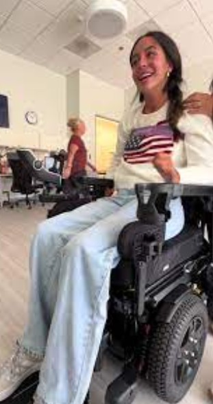 A person using an assistive device.